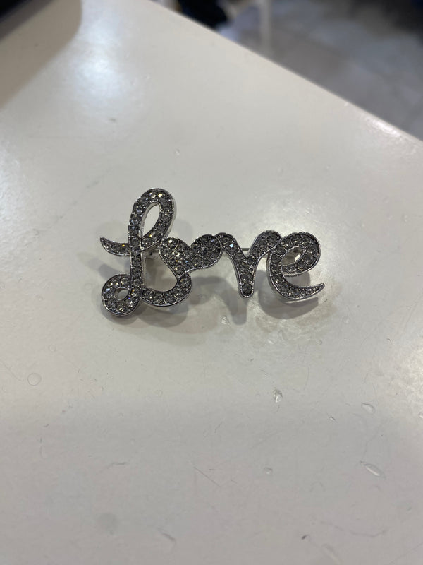 Spilla Love